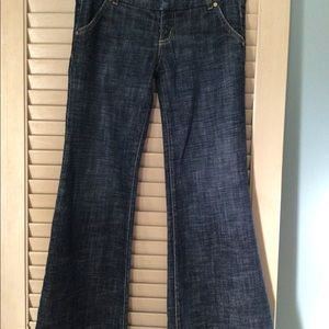 Bebe women’s jeans flared bottoms, low rise.